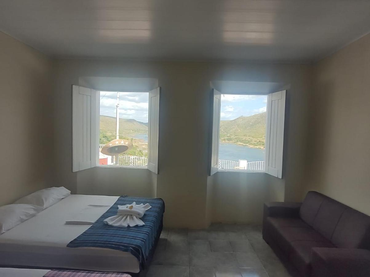 Quarto Triplo com Vista da Cidade